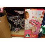 An IKEA child's painted table and two chairs, a Barbie child's bike, a Balin Zoobs Drive body board,