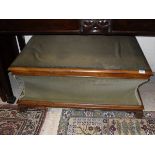 A Victorian mahogany framed upholstered box ottoman together with a modern shaped mirror