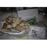 An Izzi Wotnot moses basket, an Ella & Otto playmat, various gro bag sleeping bags, a bedding bale,