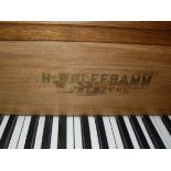 A circa 1900 mahogany cased baby grand piano,