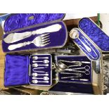 A box containing assorted silver plated cutlery to include fish servers, tea spoons,