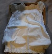 A box containing a Honiton lace decorated Christening gown,