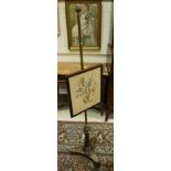 A Victorian rosewood and brass column pole screen,