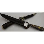 A Gebrüder Rauh steel-bladed knife with carved antler handle depicting running deer,