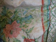 Three pairs of cotton interlined curtains of multi-coloured floral design