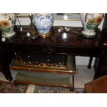 A circa 1900 mahogany serving table in the Adam taste,