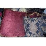 A large collection of assorted scatter cushions