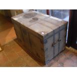 A 19th Century Seaman's chest, iron bound with treated canvas covering,