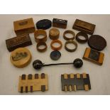 A bag containing assorted treen ware to include a mauchline box and napkin ring, bridge markers,