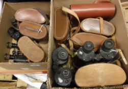Two boxes containing assorted binoculars / field glasses to include a pair of Eubeeco Navigator 9 x
