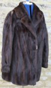 A dark brown mink fur jacket bearing label inscribed "By Gartenhaus"