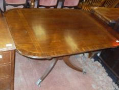A 19th Century mahogany breakfast table the rounded rectangular top,
