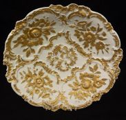 A Meissen relief work bowl with gilded decoration of panels of roses