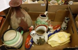 A Sadler race car teapot, a Roskyl pottery jug, French pottery lizard, grape and vine decorated jug,