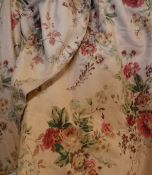 Two pairs of cotton Laura Ashley curtains, the peach ground with floral decoration,