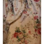 Two pairs of cotton Laura Ashley curtains, the peach ground with floral decoration,