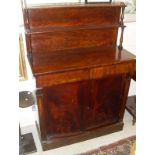 A 19th Century mahogany chiffonier with three-quarter brass gallery top shelf on baluster turned