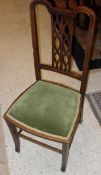 A set of four Victorian mahogany balloon backed dining chairs together with two Edwardian mahogany