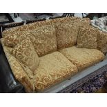 A Duresta sofa in scrolling foliate upholstery