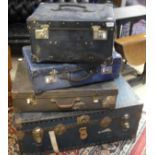 A 20th Century travel trunk and three various suitcases,