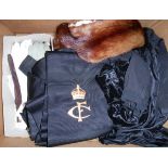 A box containing fur tippet, red silk shawl, various leather gloves,