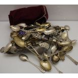 A bag containing various silver souvenir spoons for various towns to include Bath, Ludlow, Buxton,