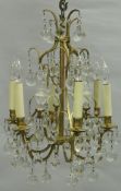 A 20th Century gilt brass and glass drop six branch electrolier,