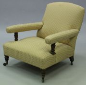 A late Victorian Howard & Son open framed armchair in pale gold striped upholstery,