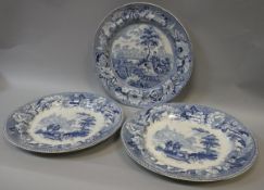 A pair of early 19th Century blue and white transfer decorated plates by Turner depicting a family