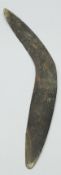 A 19th Century Aboriginal carved wooden boomerang of plain form,
