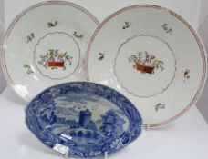 A pair of 19th Century Welsh pottery dishes painted with a basket of flowers and floral sprays,