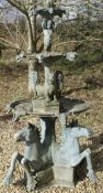 A cast metal three tier fountain in the Neo-Classical style,