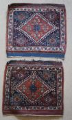 A pair of Ashgar rugs,