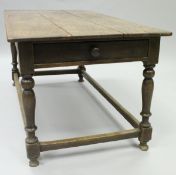 A 19th Century oak centre table,
