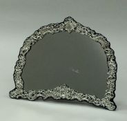 An Edwardian silver dressing table mirror,