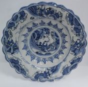 A late 17th Century English Delft lobed dish in the Chinese taste,