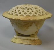 An Edwardian Royal Chinaworks Worcester blushware pot pourri with pierced cover,