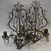 A pair of circa 1900 Continental chocolate patinated bronze table candelabra,