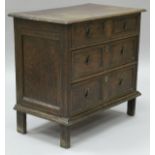 An oak square front chest in the 17th Century manner,