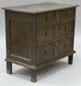 An oak square front chest in the 17th Century manner,