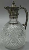 A Victorian silver mounted cut glass claret jug,