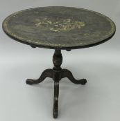 A 18th Century black lacquered chinoiserie decorated tea table,