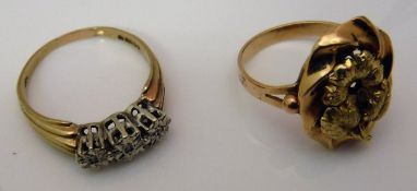 A modern 9 carat gold diamond three stone dress ring (London 1980), approx 0.