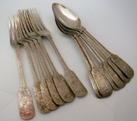 A set of six George V silver dessert spoons with engraved floral decoration and initials (by W S