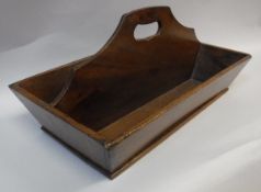 A 19th Century plum wood two section cutlery tray of canted form, the divider serving as the handle,