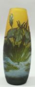 A Gallé cameo glass vase decorated with lilies on a pond,