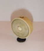 A 19th Century ivory and metal mounted seal of circular form with ringed decoration to the front,