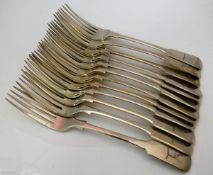 A set of eleven William IV silver "Fiddle" pattern table forks (by George Turner, Exeter 1831),