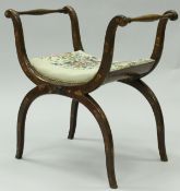 A 19th Century Dutch Continental walnut and inlaid dressing stool of Etruscan stylised X form with