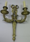 A set of six 19th Century gilt bronze two branch wall sconces in the Neo-Classical manner by Henry